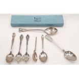 A quantity of silver spoons to include jam and teaspoons.