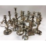 Large quantity of candelabras to include silver.