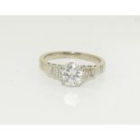 An 18ct gold and platinum diamond solitaire approx 1.2ct, Size N.