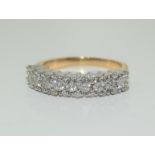 A 1 carat Diamond and 9ct gold multi stone half eternity band ring, Size O 1/2.