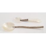 A pair of Oriental silver and mother of pearl spoons