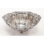 A decorative silver dish.