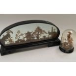 Oriental carved cork scene together with a dome cork display.