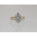 An 18ct gold diamond lozenge shaped dress ring of 50 points. Size L