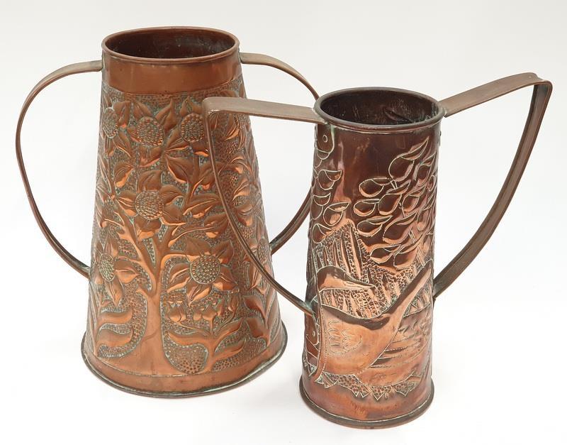 Two twin handled copper embossed vases in the Keswick style