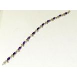 An Amethyst Diamond 925 silver line bracelet.