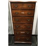 A Victorian graduated drawers walnut Tallboy of 6 drawers with brass swan neck handles
