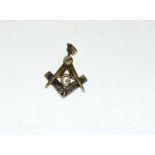 A 9ct gold masonic pendant.
