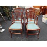Set of four vintage mahogany dining chairs.