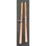 A pair of vintage wooden ski's.