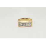 An 18ct Four stone diamond ring Size N 6.1g.