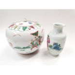 A Chinese lidded pot with vase.