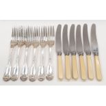 A set of six heavy solid silver Kings Pattern large knives and forks.