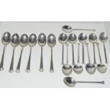 Two sets of coffee spoons 1 hallmark silver 1 Marked silver