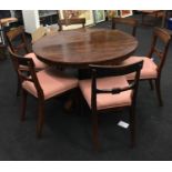 A Victorian rosewood circular tip top breakfast table and 6 chairs