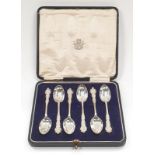 A boxed set of six silver teaspoons.