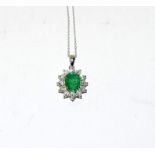 An impressive 18ct white gold emerald and diamond pendant necklace of 2.9cts.