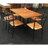 A metal Ladderax gate leg dining table and six matching leather seated chairs.