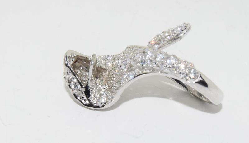 A Silver and CZ snake ring. - Image 3 of 4