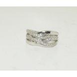 A 9ct white gold CZ ring, Size K.