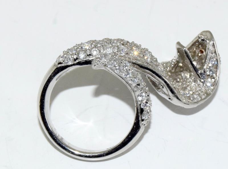A Silver and CZ snake ring. - Image 4 of 4