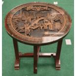 Oriental carved occasional table.