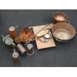 A collection of miscellaneous copper work to include jampots art nouveau jugs copper trivet watering