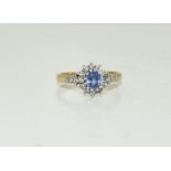 A 9ct gold ladies Sapphire and Diamond Ring, Size L.