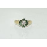 A 9ct Gold ladies Diamond centre ring, Size O.
