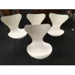 Four Fritz Hansen Series 7 chairs.