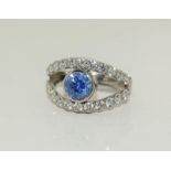 A blue gemstone 925 silver ring, size O 1/2.