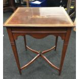 Mahogany inlaid hall table with boxwood inlay and diagonal cross stretchers.