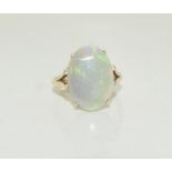 A 14ct solid opal ring, size O.