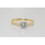 An 18ct gold diamond solitaire ring of 40 points approx.