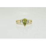 A 9ct Peridot and diamond ring size N