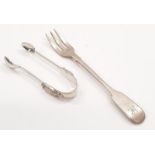 Silver sugar tongs together with a small silver fork.