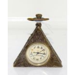 A Brass cased triangular masonic watch.