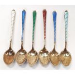 A set of six enamelled Sterling tea spoons.