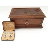 A boxed set of silver collar studs together with a carved jewellery box.
