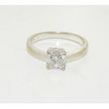 An 18ct white gold diamond solitaire 1ct H/M ring, size M