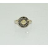 A natural vintage opal marcasite on silver ring, Size O.