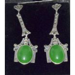 A pair of silver Marcasite and jade paneled drop earrings in the Art Deco style.
