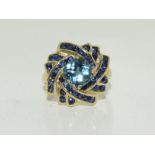 A 9ct gold ladies star burst ring.