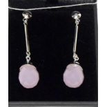 A pair of silver and rose Quartz drop earrings.
