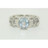 9 carat white gold Emerald and aquamarine ring size N