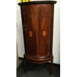 George III bow fronted mahogany corner cupboard.