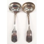A pair of heavy solid silver Kings Pattern ladles.