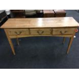 Victorian pine three drawer console table.
