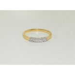Approx 0.4ct Diamond five stone on 18ct gold Size M.