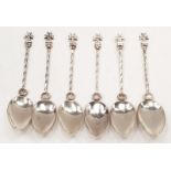 Six Maltese cross teaspoons (possibly Silver).